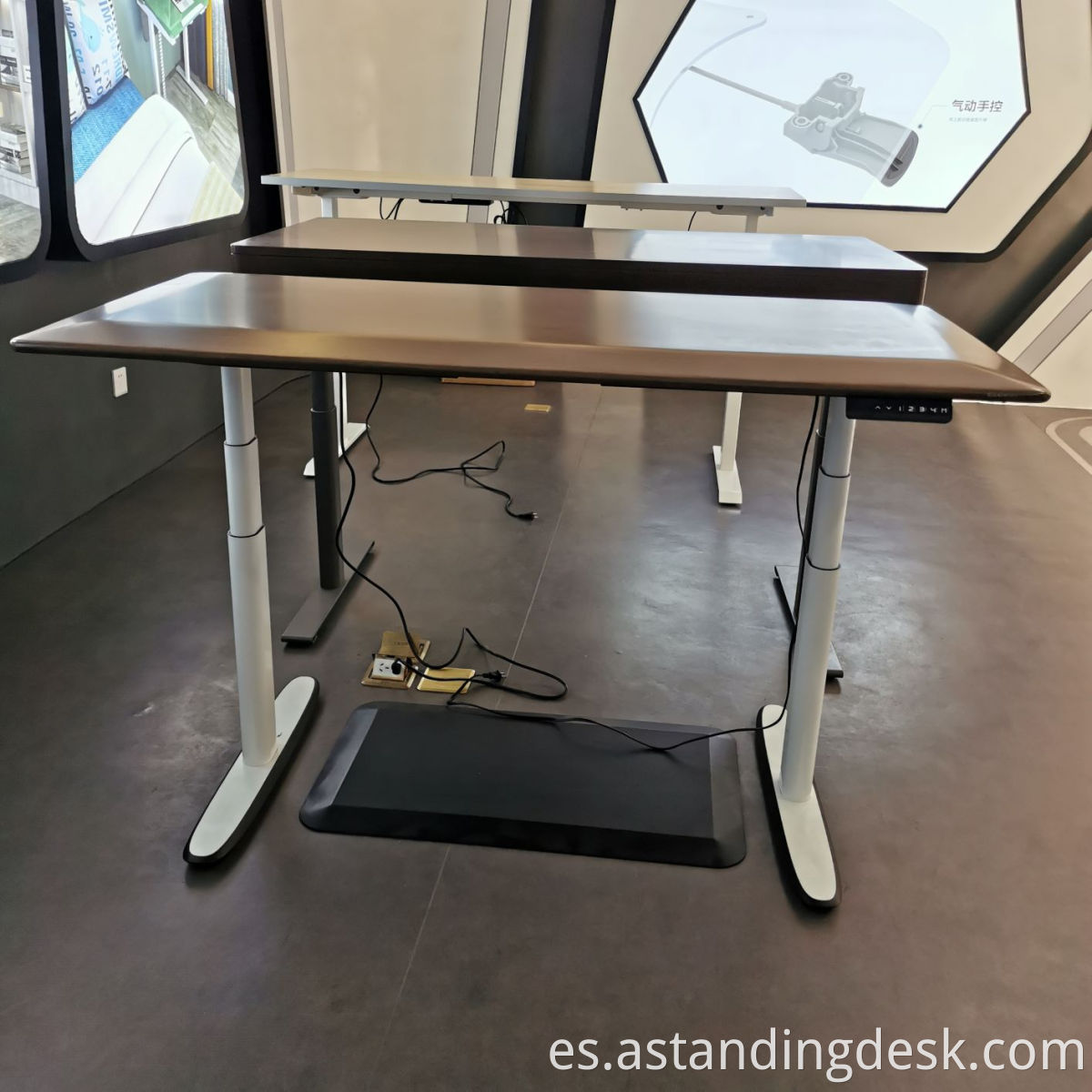 Muebles ergonómicos de oficina confiables y baratos altura de pie de pie ajustable Motor Dual Computadora eléctrica